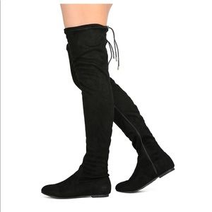 Women’s thigh high boots